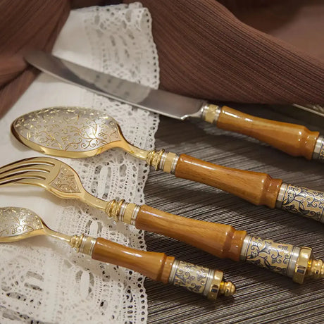 Silberbesteck Set Byzanz 4-teilig aus 925 Sterling Silber mit Edelholz-Griffen, Niello-Verzierung und vergoldeten,