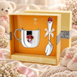 Geschenkset 925 Silber Prinzessin – Kinderbecher & Löffel in der Original-Geschenkbox — Lifestyle-Aufnahme auf cremefarbenem Satin mit Plüschtier und Schleierkraut, Geschenk zur Geburt