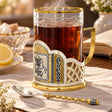 Teeglas & Löffel Set 925 Silber Kristallglas vergoldet Sieger — Lifestyle-Setting am Teetisch