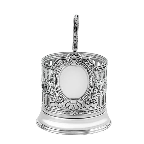 Podstakannik Patron antik patiniert 925 Silber Frontalansicht — leeres ovales Wappenmedaillon umrahmt von Lorbeerkranz und Schleife, Säulenstruktur, Akanthus-Voluten, Schwärzung in den Vertiefungen, ideal für persönliche Gravur (Initialen, Wappen, Logo)