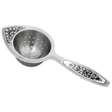 „Aurora Silber" – Teesieb aus Silber mit Niello