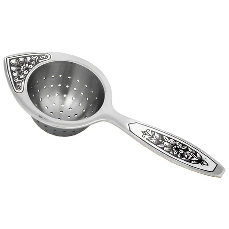 „Aurora Silber" – Teesieb aus Silber mit Niello