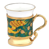 Exklusive Porzellan Kaffeetasse mit Silber-Emaille-Halter Feuervogel Motiv Gold Grün Gelb.